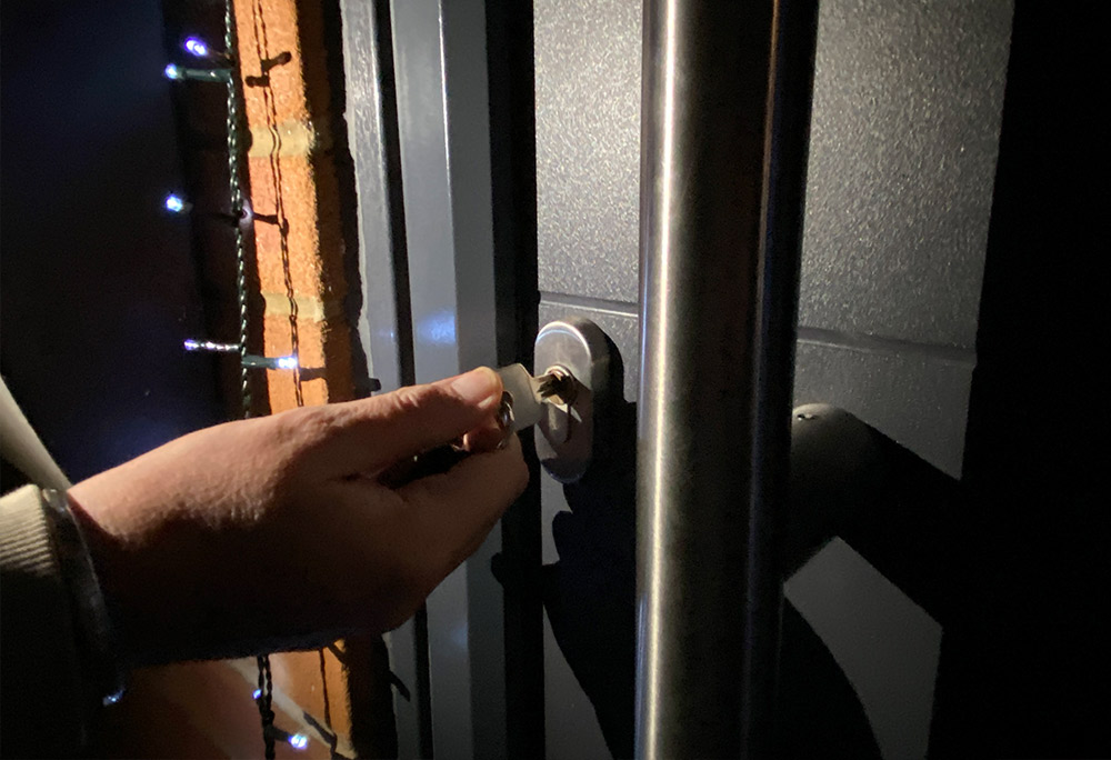 locksmith working at night