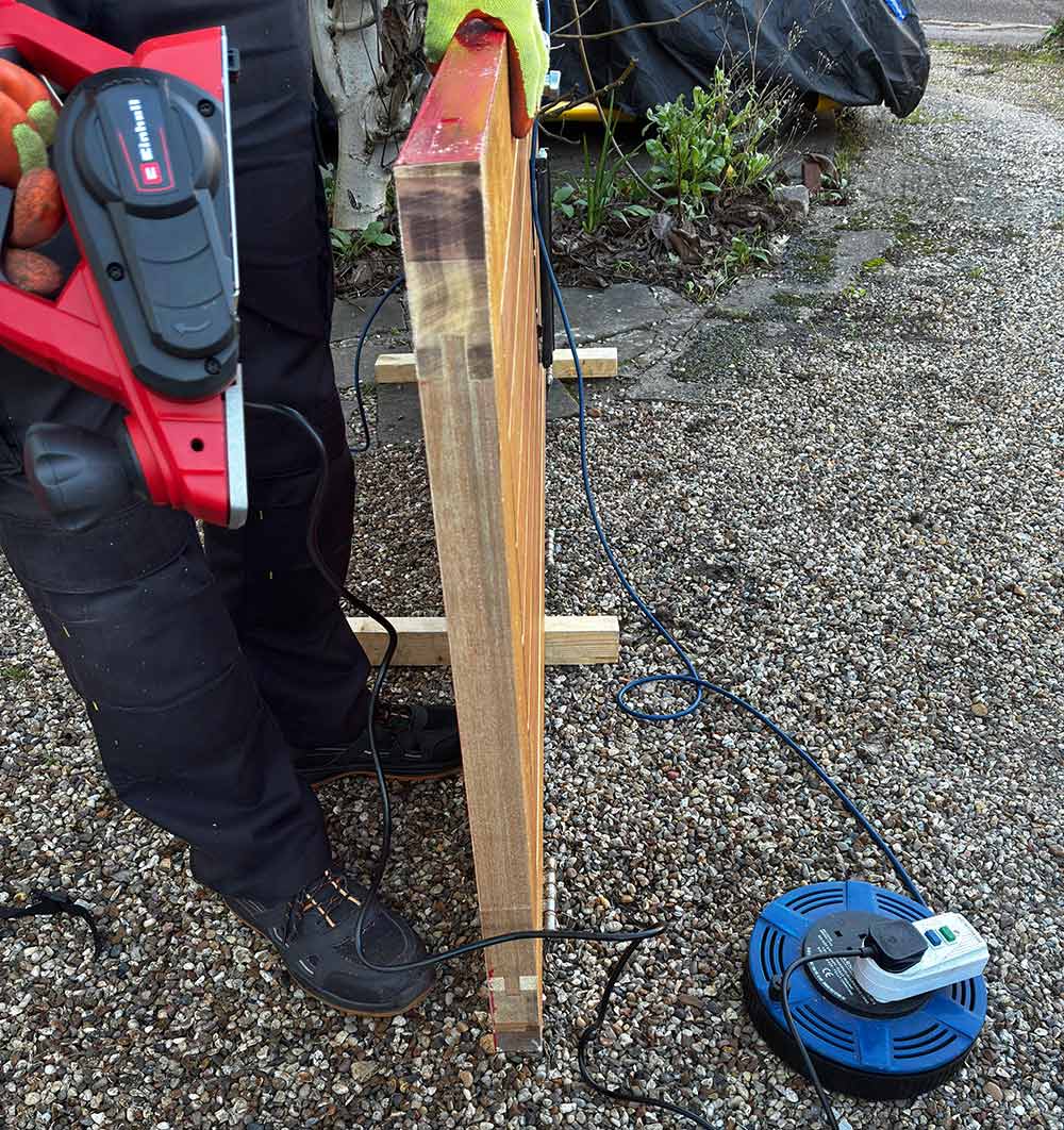 Shaving a wooden door